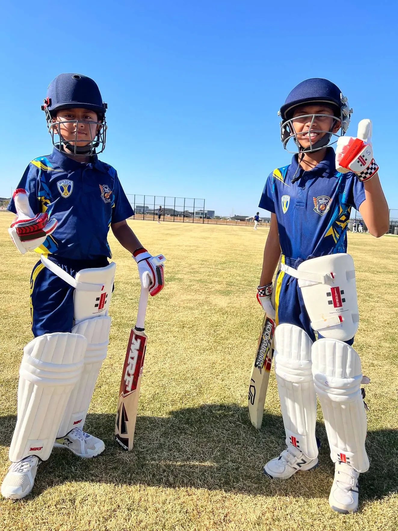 Two TNCC junior batters padded up and ready to open